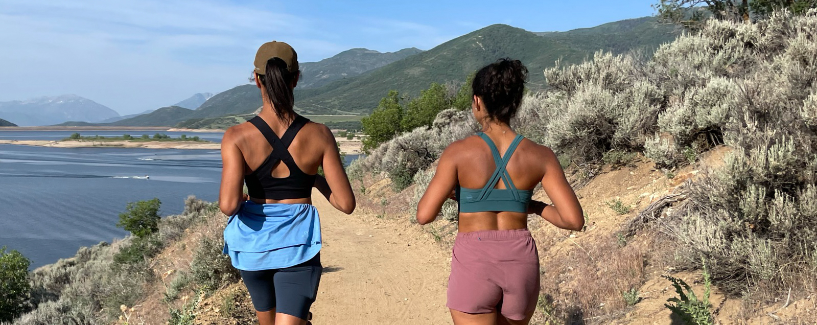 Friends Dani Reyes-Acosta Vanessa Chavarriaga Posada chat while trail running. Photo by Caroline Glech
